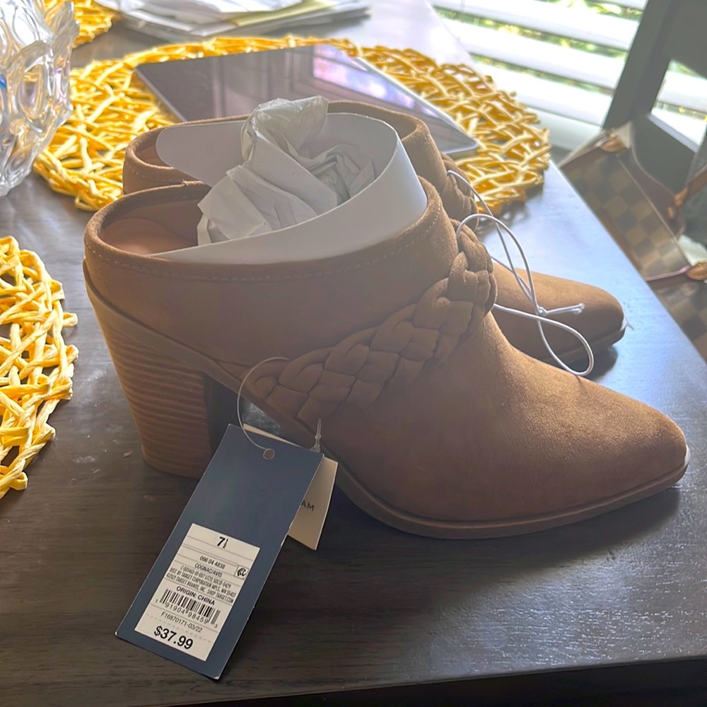 Brand new heeled booties.